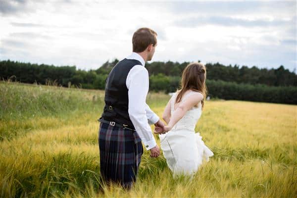 Bride and Groom in Wheat Field