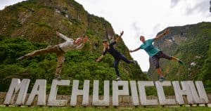 Michael, Malcolm and Dora Aldridge on Machu Picchu Sign