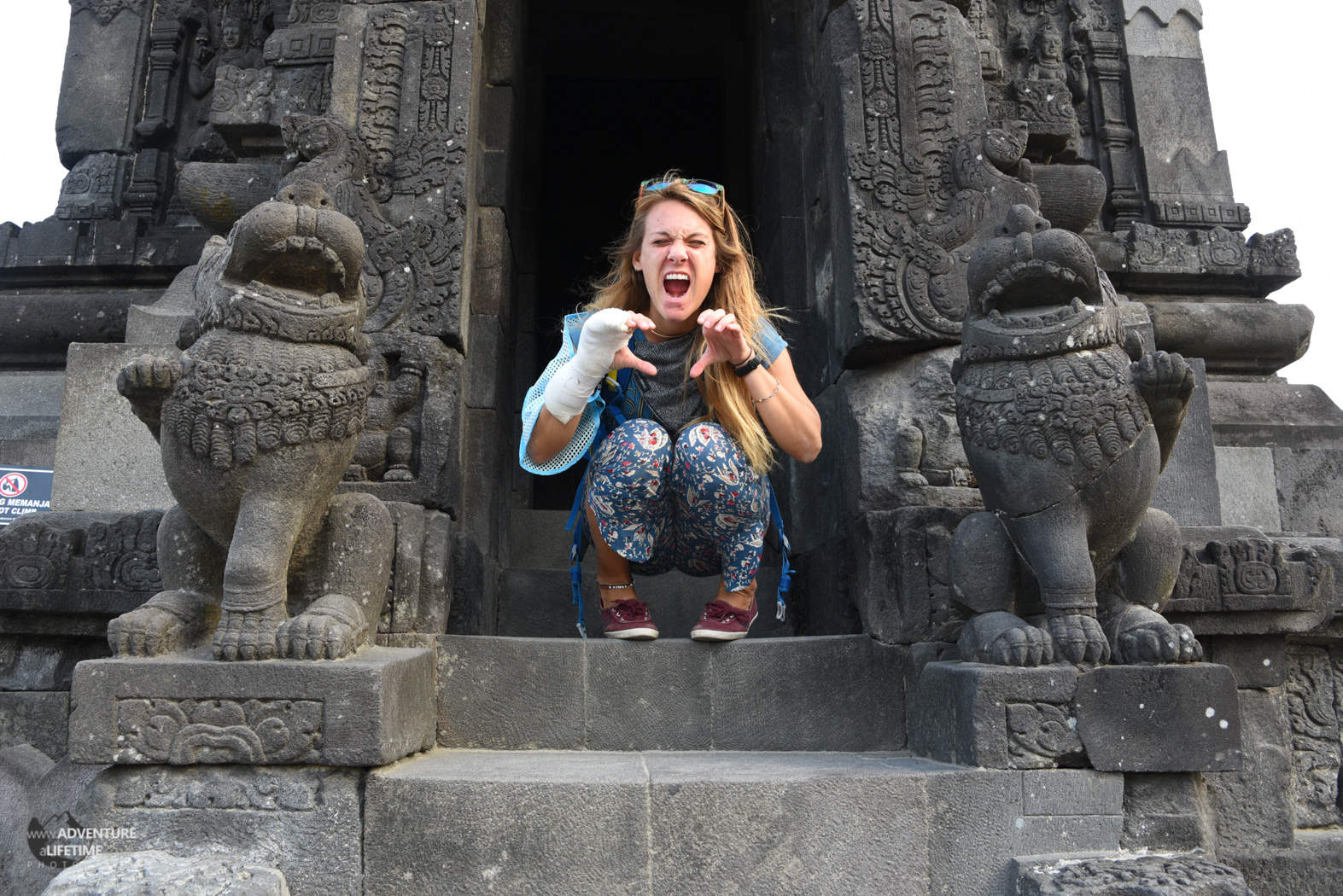 Dora doing her best Gargoyle Impression at Prambanan temple, Java